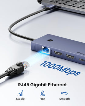 BAOZEE dock plugged into MacBook in a home office to simplify connections