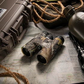 Barska Blackhawk 12x42 binoculars side view with diamond textured grip for secure handling