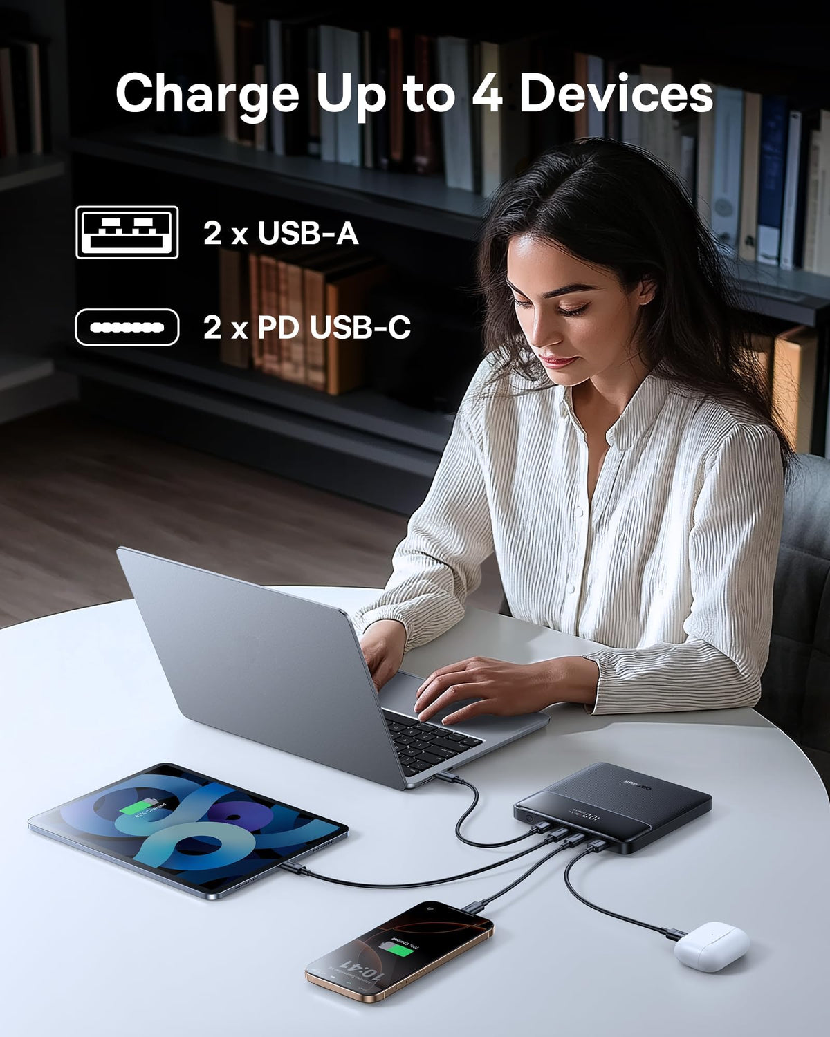 Baseus Blade 100W power bank in bag with laptop for travel-ready charging.
