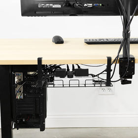 Baskiss under-bookcase setup shows versatile storage for accessories.