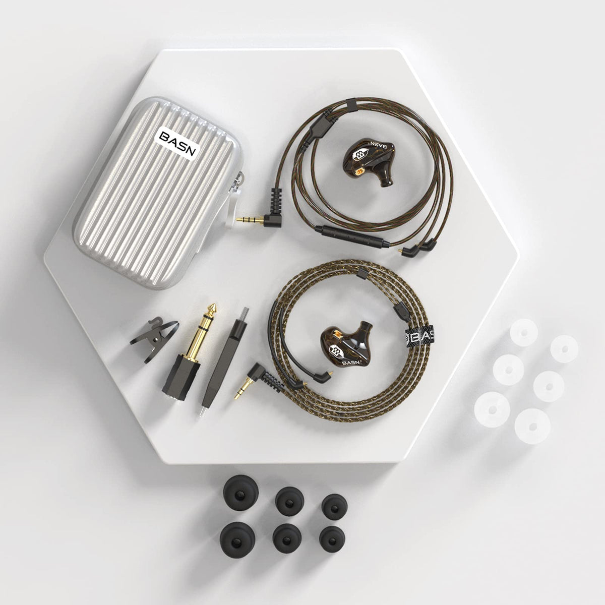 BASN Bsinger accessories layout with eartips, adapter, and cleaning tools for maintenance