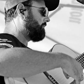 BASN Bsinger PRO worn by musician demonstrating secure over-ear fit and stable monitoring