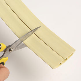 Bates Choice low-profile cord cover keeps spaces neat and accessible.