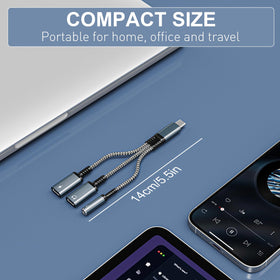 Bawanfa adapter next to coin for scale demonstrating compact pocket-friendly size