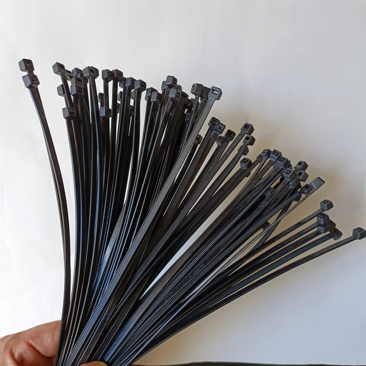 BBDOU zip ties 8-inch garden fix enables tidy trellis and tool organization.