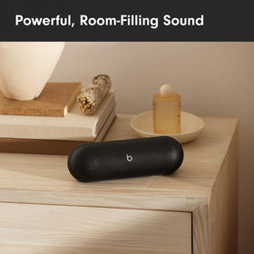 Close-up of Beats Pill woofer details showing deep bass potential and dynamic range.
