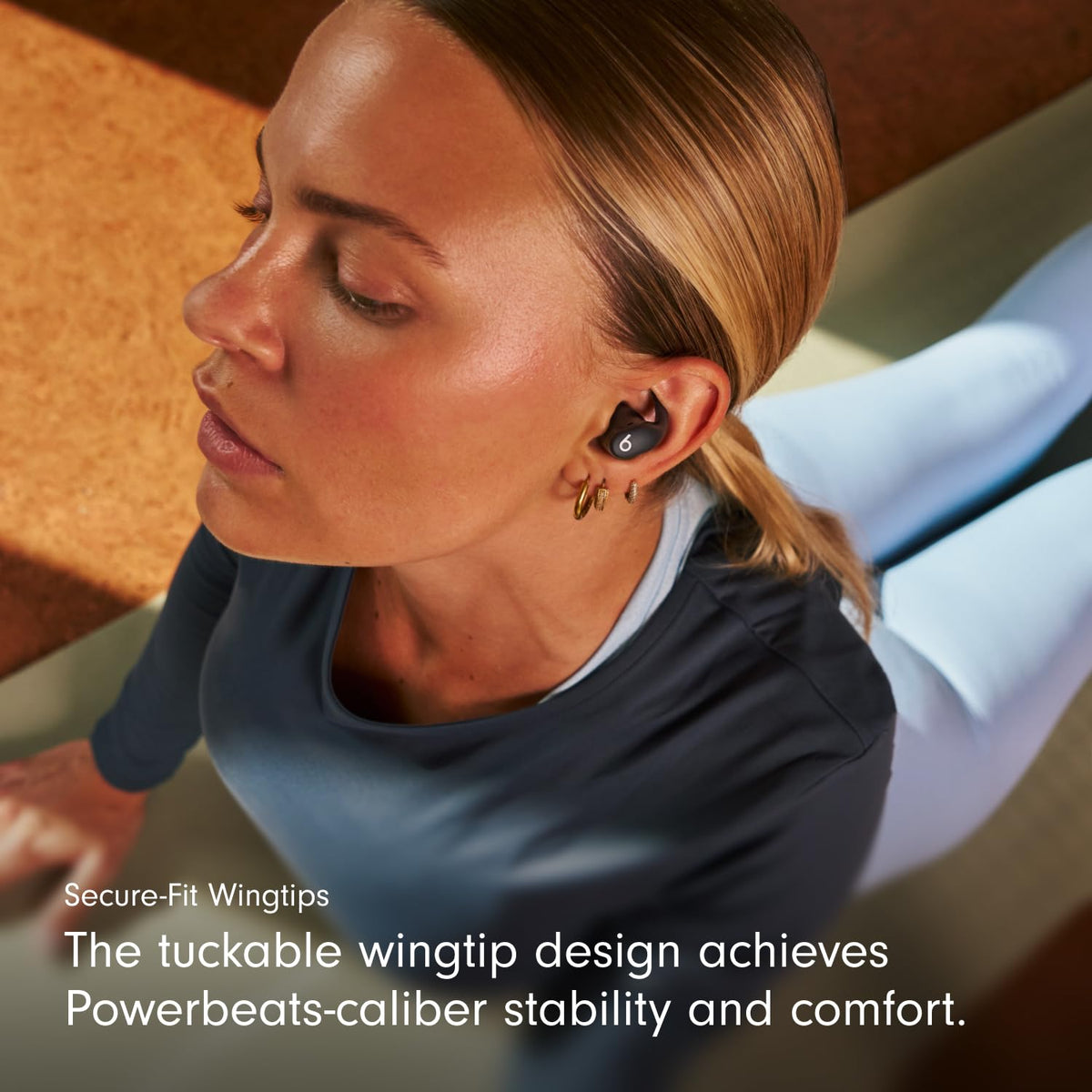 Beats Powerbeats Fit compact charging case extends listening time up to 30 hours.