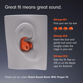 Beats Powerbeats Fit secure wingtips close-up highlighting stability during exercise.