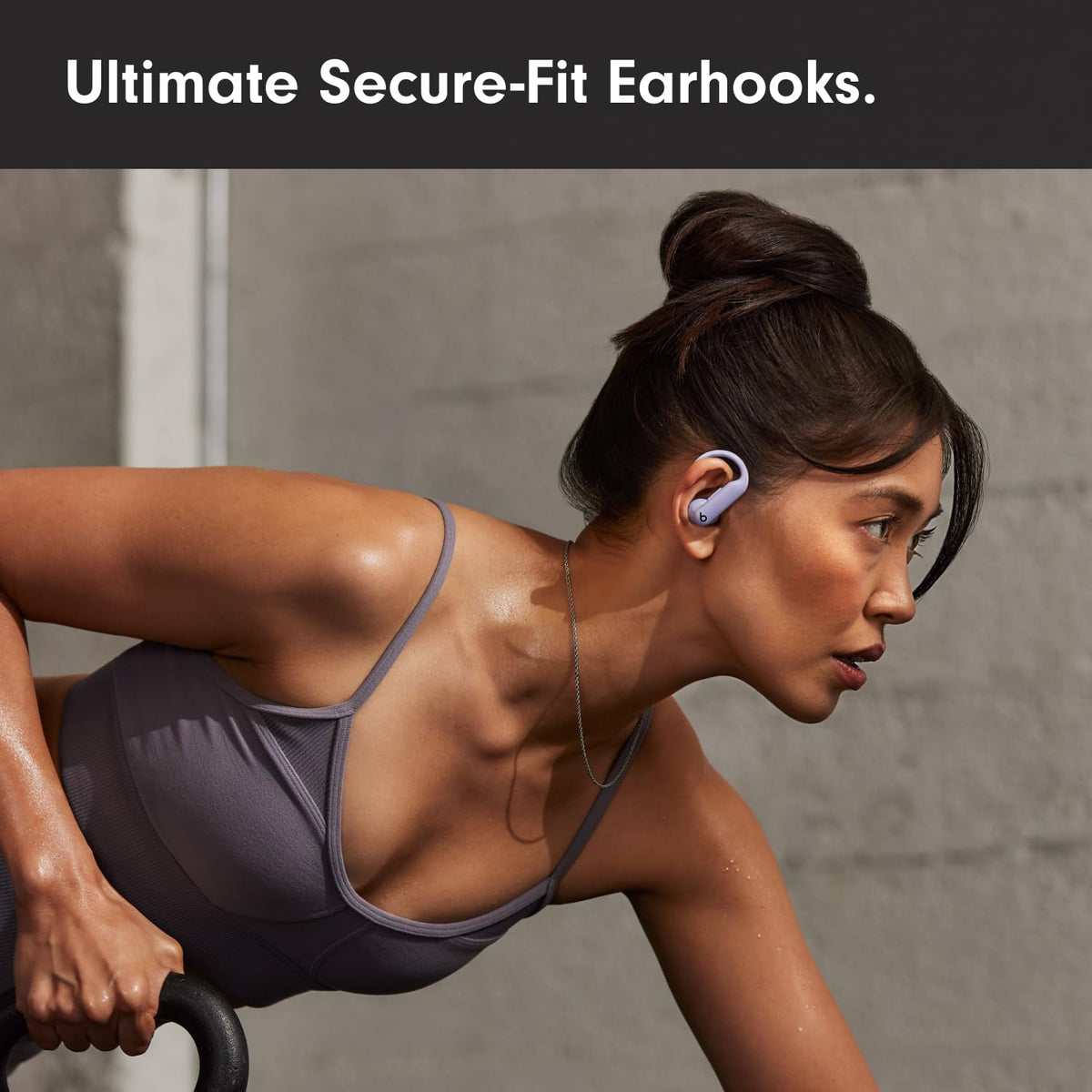 Beats Powerbeats Pro 2 optical heart rate sensor embedded for workouts.