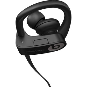 Beats Powerbeats3 worn by runner illustrating stable fit and sweat-resistant design