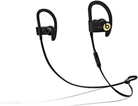 Beats Powerbeats3 worn by runner demonstrating secure fit and sweat resistance