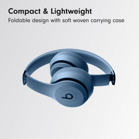 Beats Solo 4 in slate blue folded for easy storage and travel.