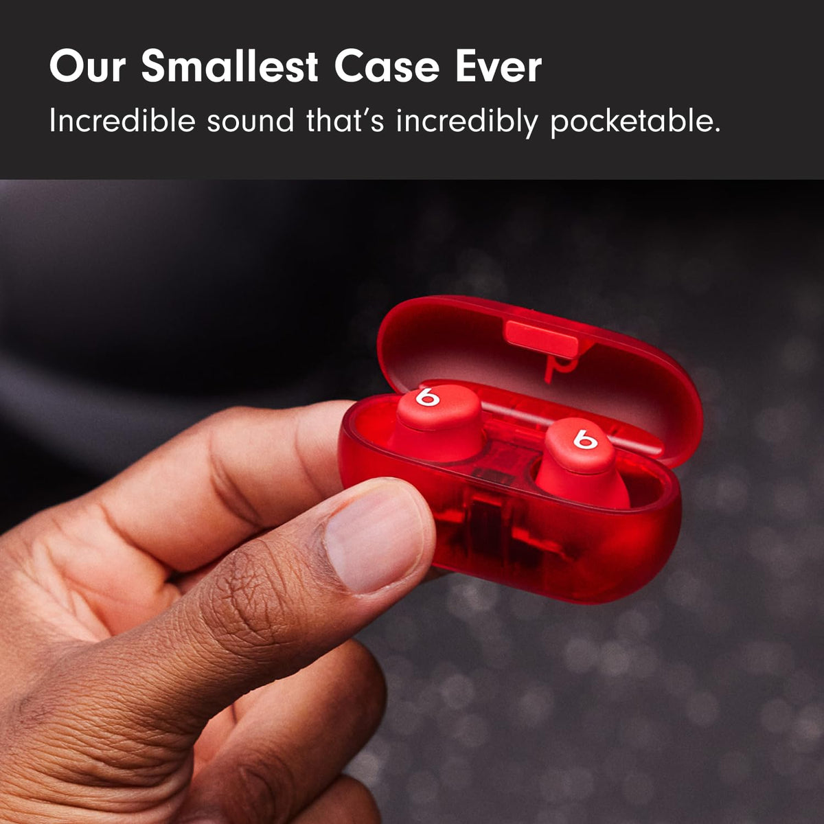 Beats Solo Buds compact case on table emphasizes portability and easy travel