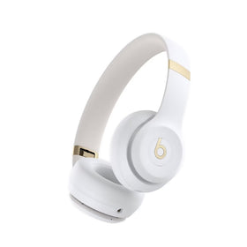 Beats Solo 4 on-ear headphones in warm white with bold sound, front view for daily listening.