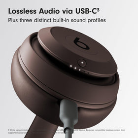 Beats Studio Pro renewed brown headphones folded for compact portability