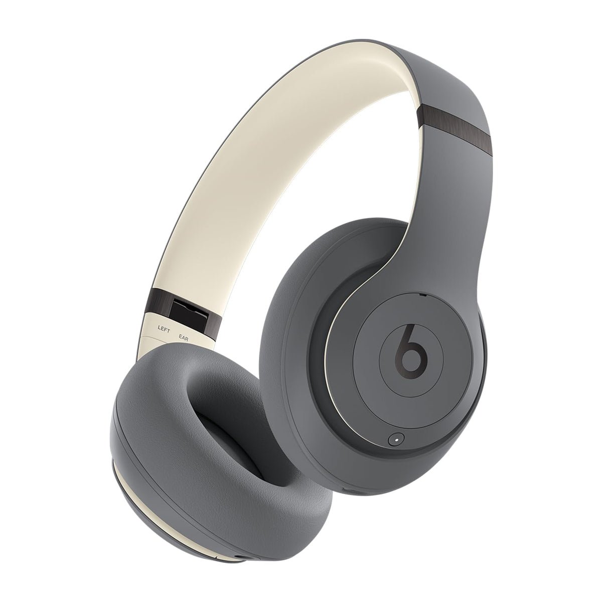 Beats Studio Pro sand gray headphones on table for premium listening experience