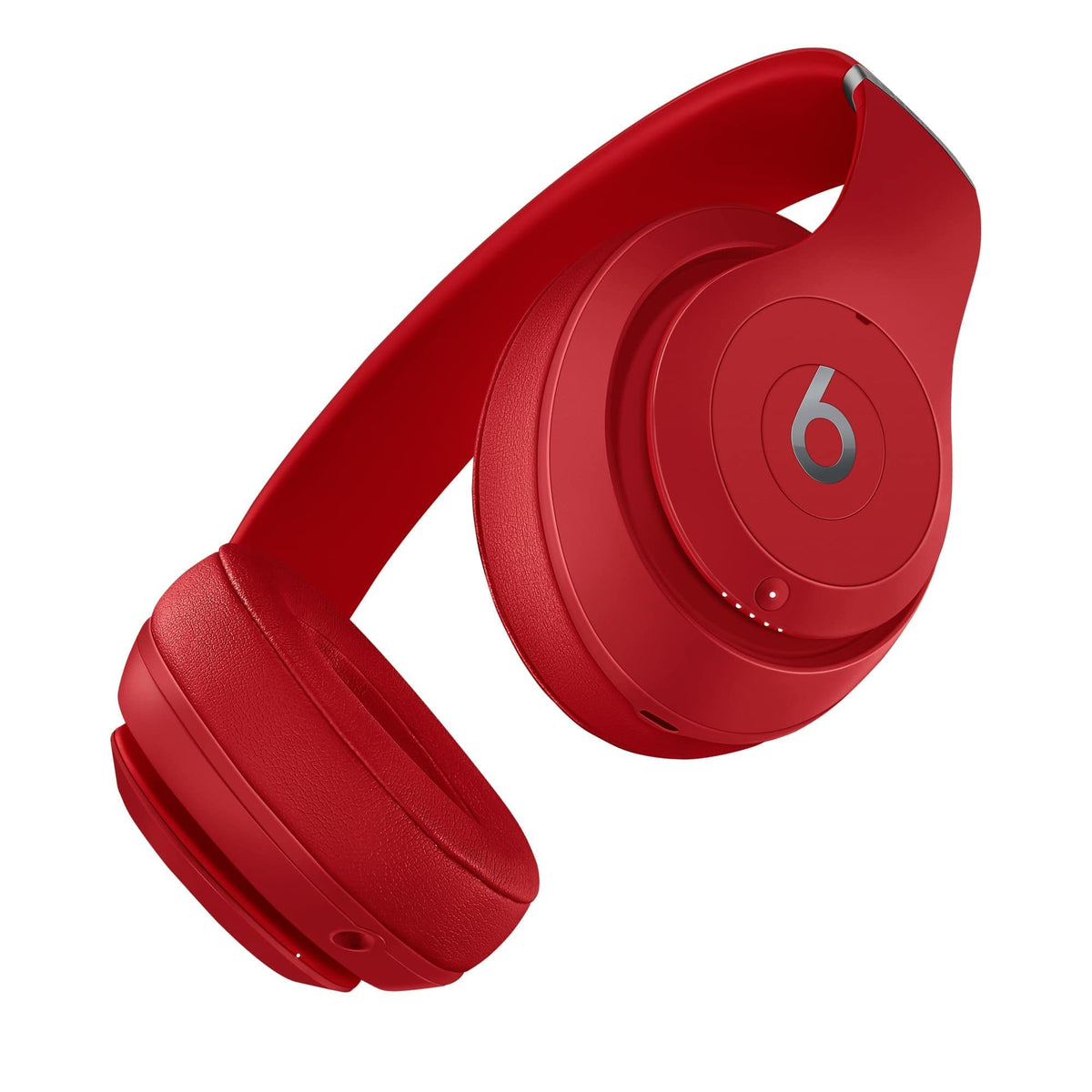 Beats Studio3 red wireless headphones, side view, comfortable fit for long sessions.