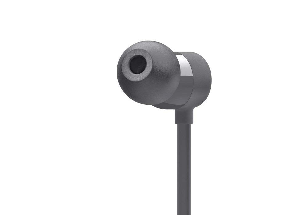 Model wearing BeatsX renewed gray around neck during commute, Beats stability while moving