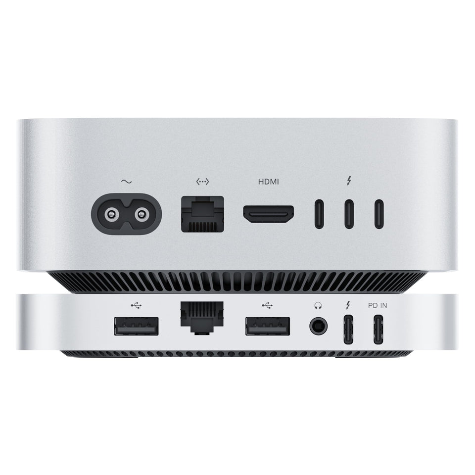 Beelink EX Mate Mini-A dock beside Mac mini M4 for organized workspace and expansion.