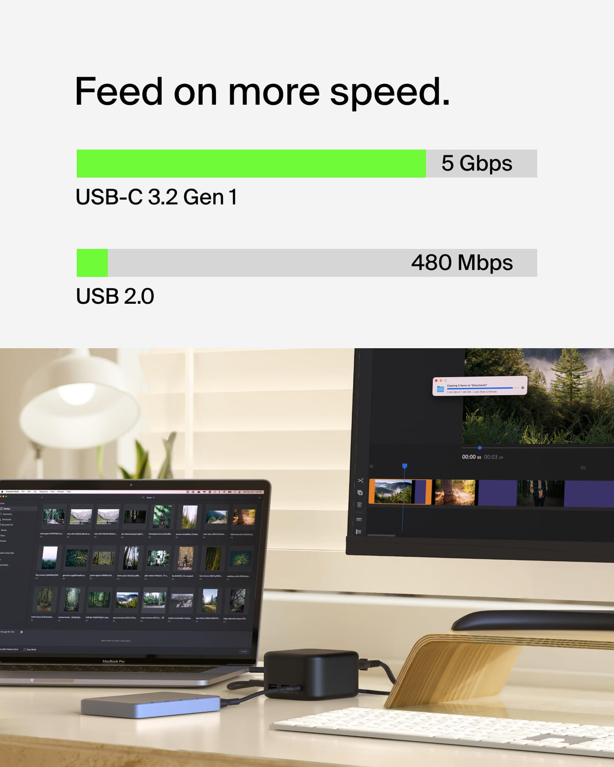 Belkin dock with Ethernet cable plugged in, providing stable Gigabit network speeds for work
