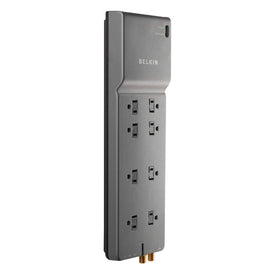 Belkin flat-plug power strip saves space and keeps cords near the wall.