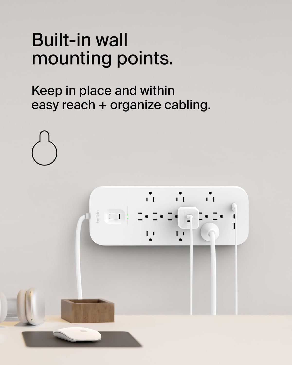 Belkin used on a desk powering monitor, laptop and phone for organized workspace