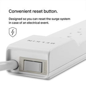 Belkin lifestyle desk setup powering laptop and monitor for organized workspace safety