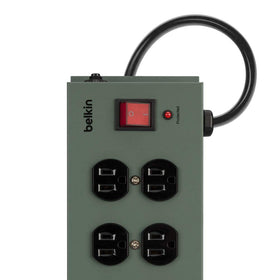 Belkin mounted under desk demonstrating wall-mount holes for organized setup benefit