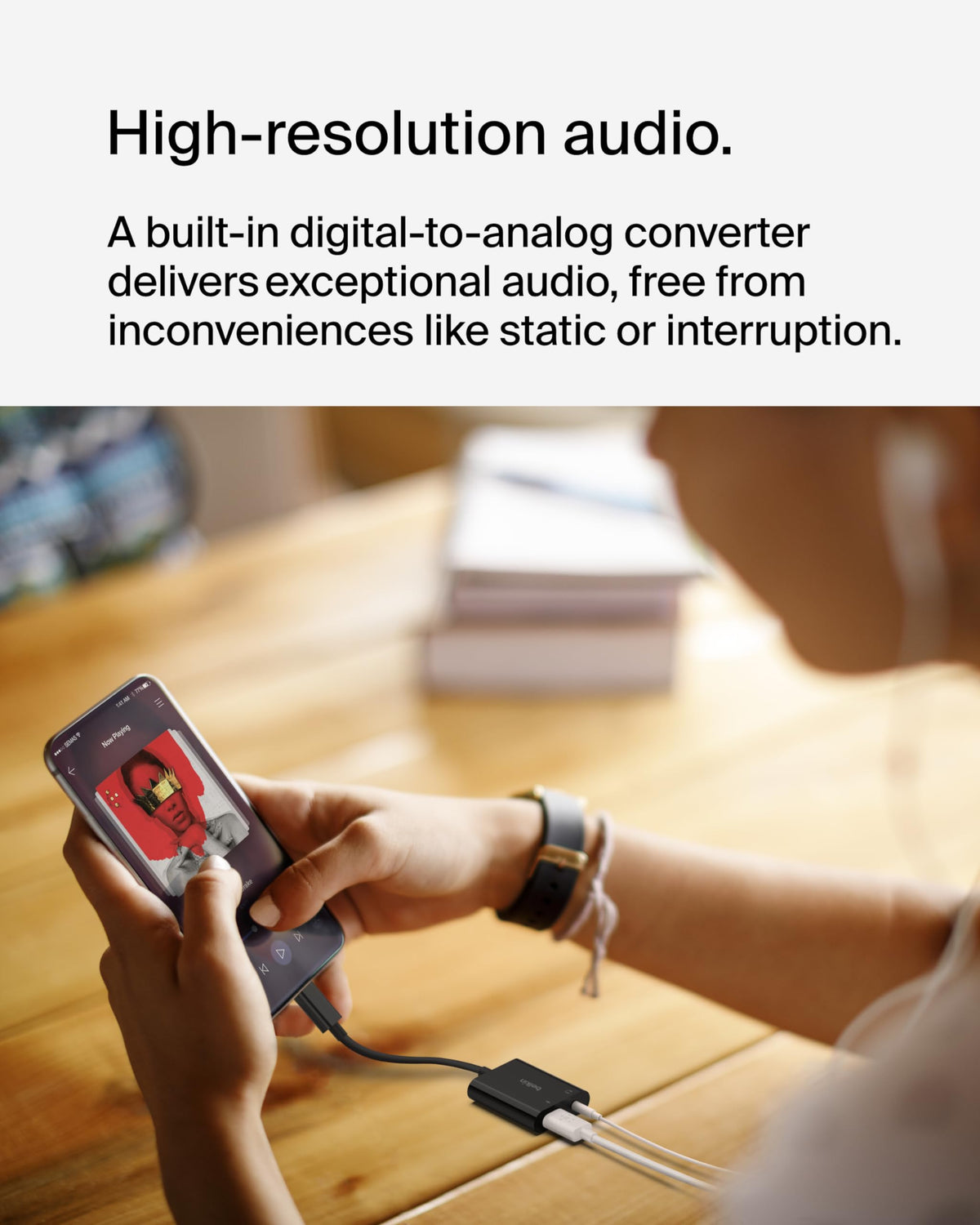 Belkin ROCKSTAR powering a tablet while music plays, preserves battery life
