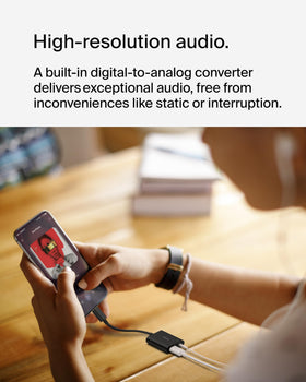 Belkin ROCKSTAR powering a tablet while music plays, preserves battery life
