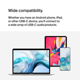 Belkin ROCKSTAR beside a coin showing compact scale and travel-friendly size