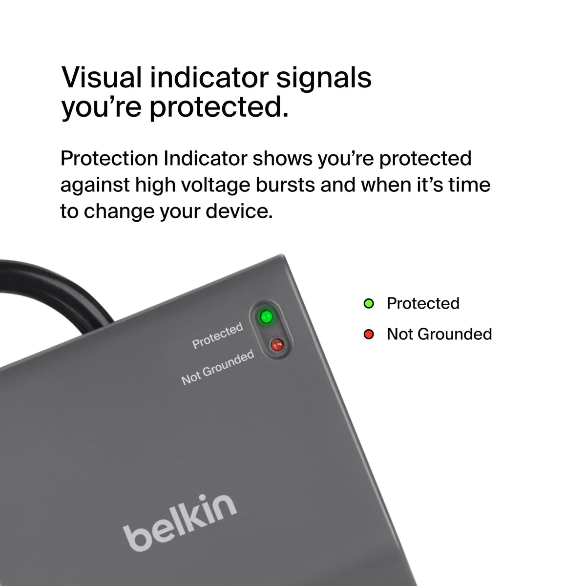 Belkin size comparison next to a laptop showing compact footprint
