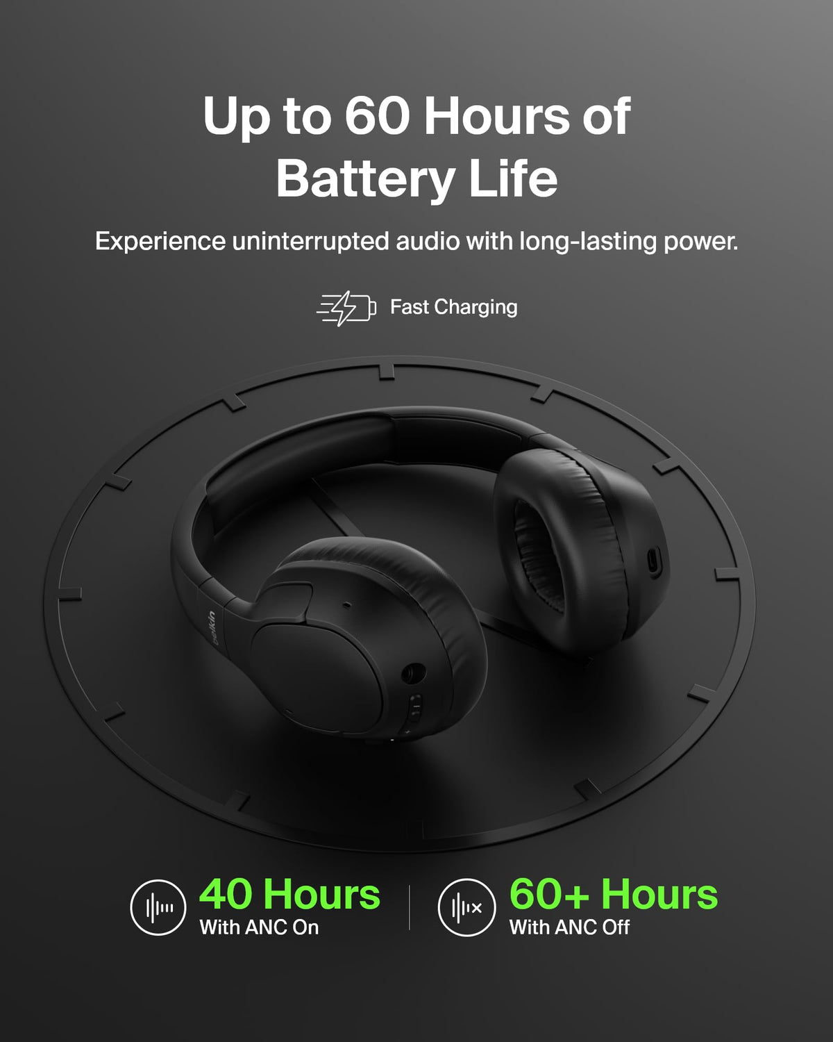 Belkin SoundForm Isolate on desk with laptop showing multipoint connection convenience