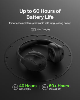 Belkin SoundForm Isolate on desk with laptop showing multipoint connection convenience