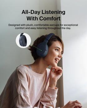 Belkin headphones worn at a desk providing focused listening for work