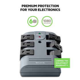 Belkin wall-mount surge protector installed to save desk space and organize cords