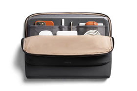 Bellroy Laptop Caddy front pocket keeps mouse and peripherals neatly organized for quick access.