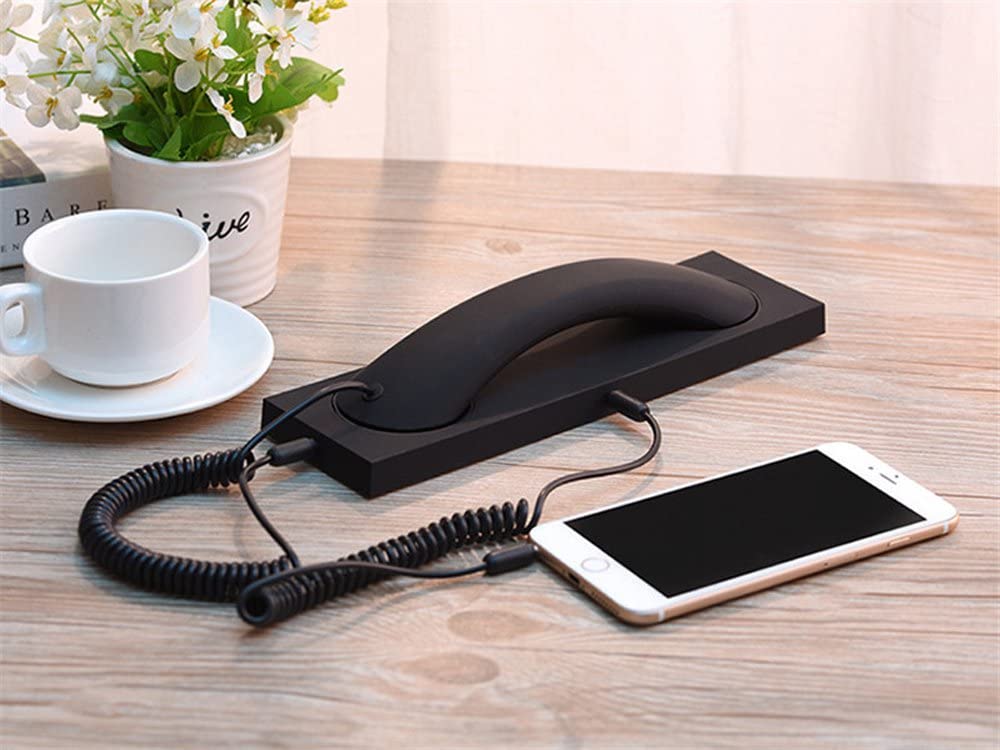 Berfea retro handset demonstrating music and call control on the device.