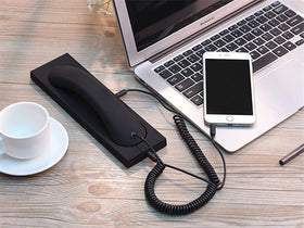 Berfea retro handset in use during a call for easy control on the go.