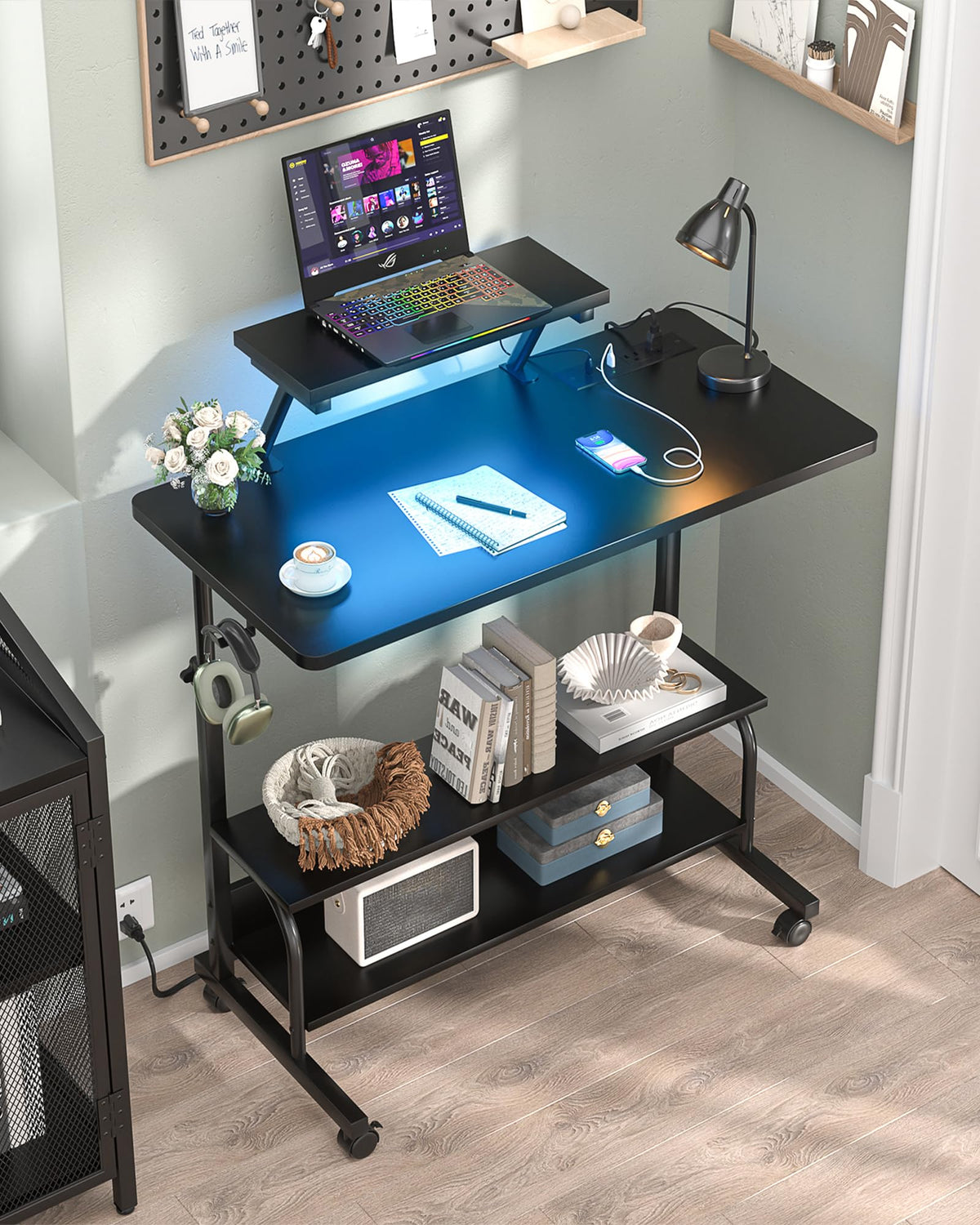 Besiost height adjustable desk with vibrant RGB lighting options.