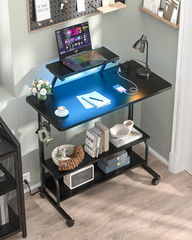 Besiost height adjustable desk with vibrant RGB lighting options.