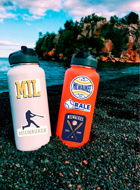 BESSER ASSOCIATES stickers applied to water bottle showing durable outdoor protection