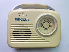 Bingxue portable AM FM radio with a large dial for easy tuning, ideal for seniors.