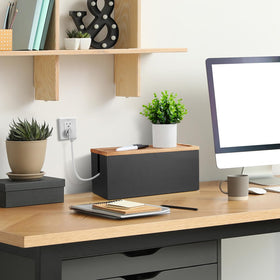 Bivvclaz placed under desk hiding power strip to keep workspace tidy