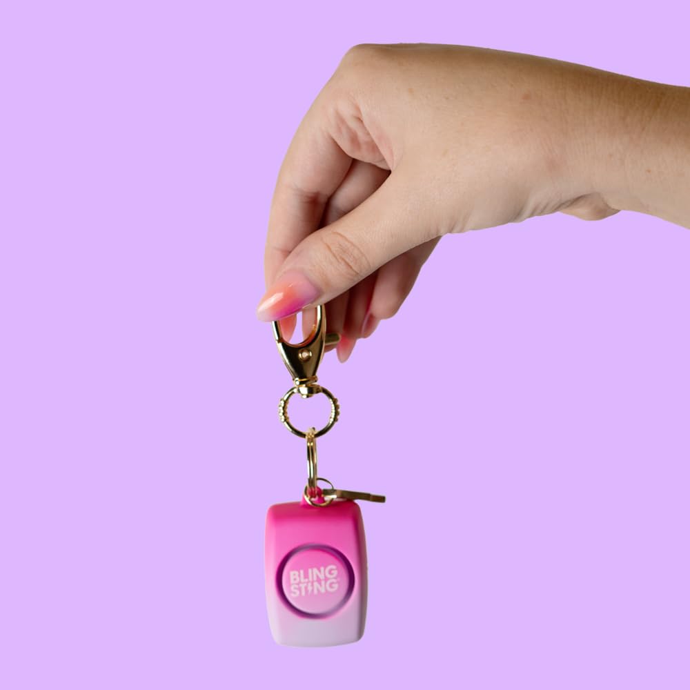 blingsting alarm with recessed button to prevent accidental alarms