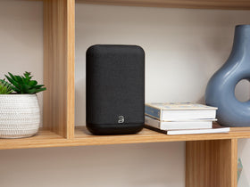 Bluesound Pulse Flex wireless surround setup with compatible Bluesound gear for immersive audio.