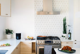 BluOS enables multi-room integration for synchronized listening across Bluesound devices