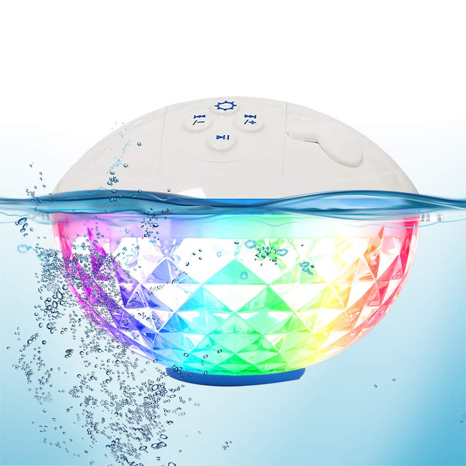Blufree floating pool speaker on water surface with ambient lights for pool parties.