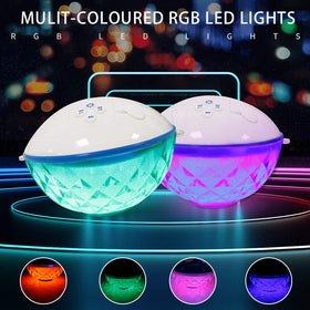 Blufree pool speaker glowing at night, delivering immersive sound for outdoor gatherings.