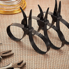 Boao ties bundling computer cables behind desk to simplify cable management and reduce clutter